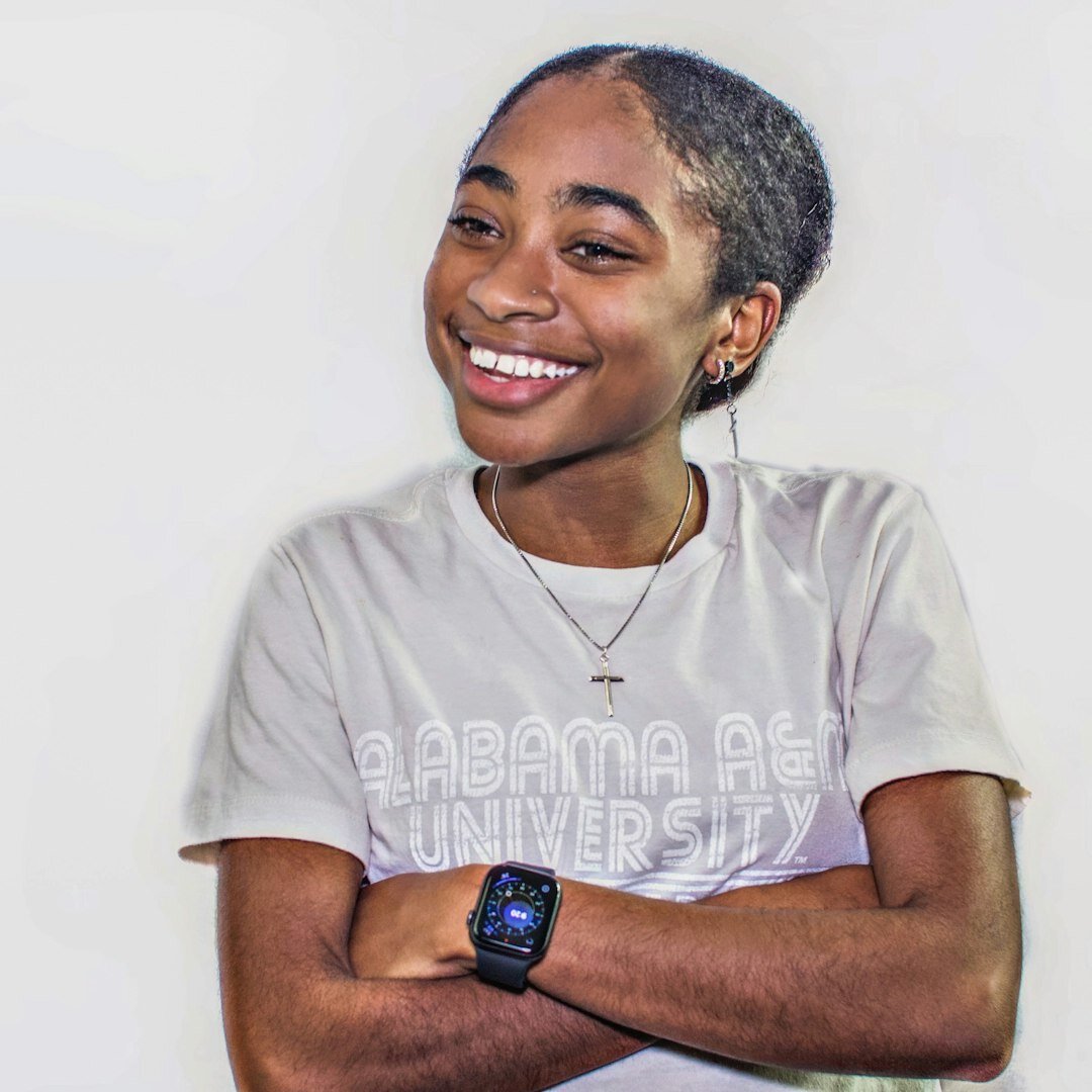 Female video editing trainer smiling