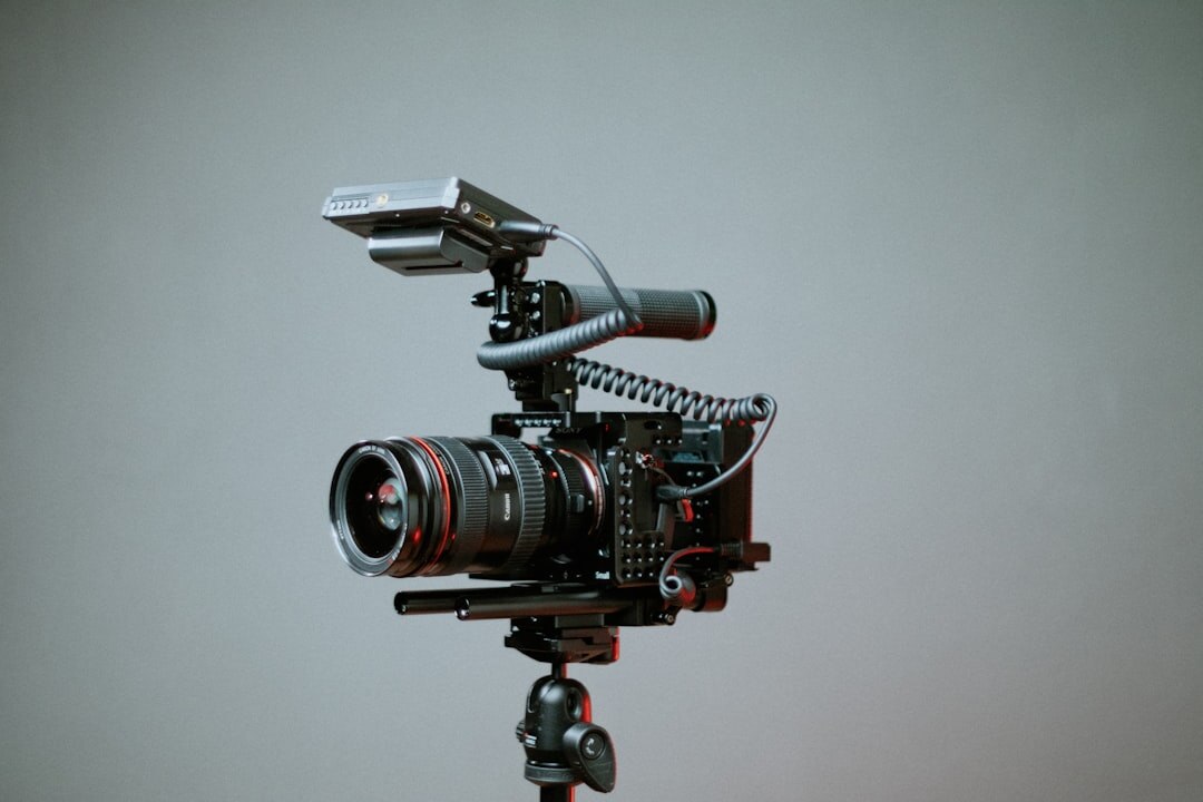 Professional video camera on a tripod set up for filming