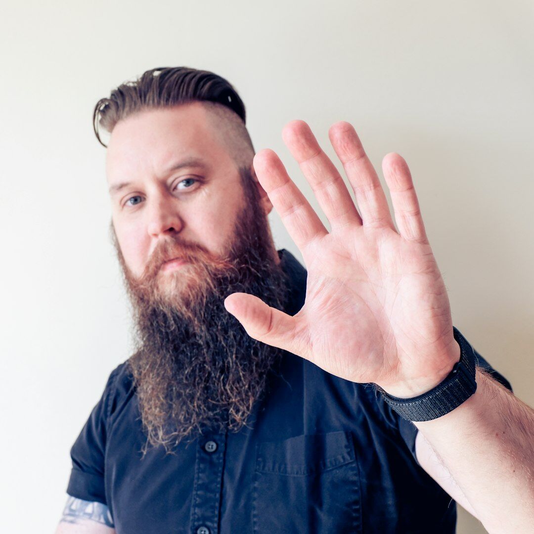 Documentary director trainer with beard